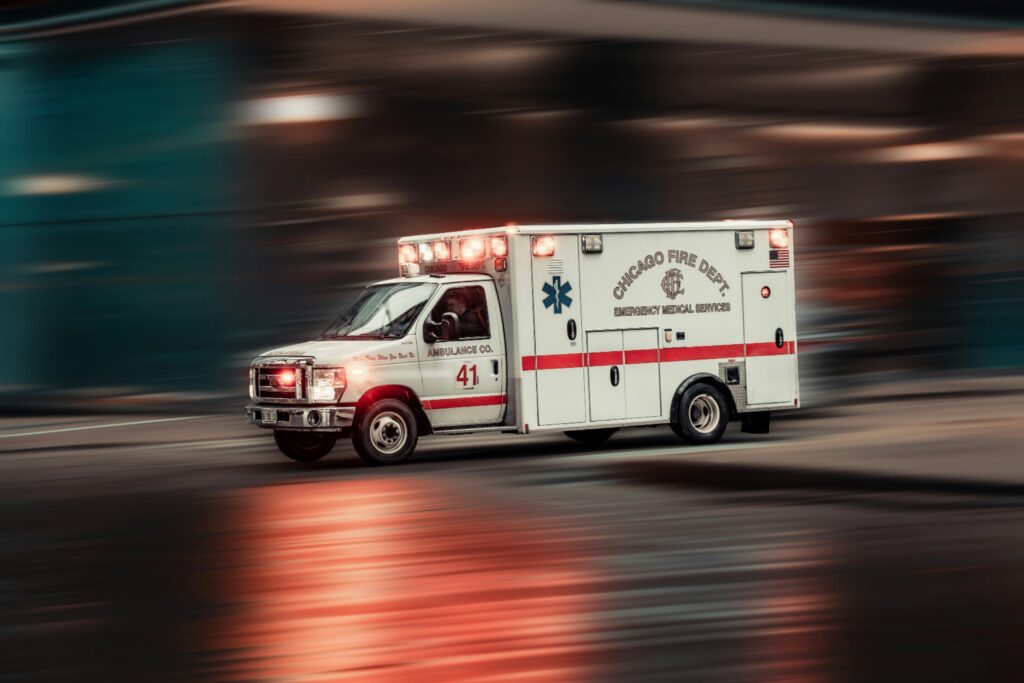 Dynamic capture of a Chicago Fire Dept ambulance rushing through city streets.